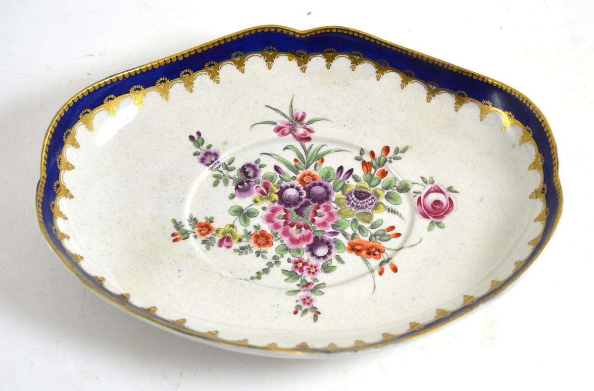 First period Worcester porcelain sauce tureen stand, circa 1775, painted with flowers sprays, 24cm