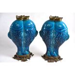 A pair of 19th century ormolu mounted Chinese turquoise glazed porcelain vases, in the form of