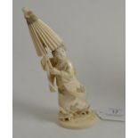 A 19th century Japanese Meiji period carving of Bijin holding a parasol, 19cm high