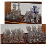 Four trays of assorted glassware including engraved Edwardian glasses, two decanters, jugs,