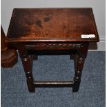 An early 18th century English oak joint stool