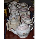 A Factory Z porcelain teapot and cover, eight various Newhall and similar teapots and seven