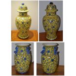 # A pair of modern yellow ground Chinese vases, 37cm high and a similar pair with lids, 57cm high