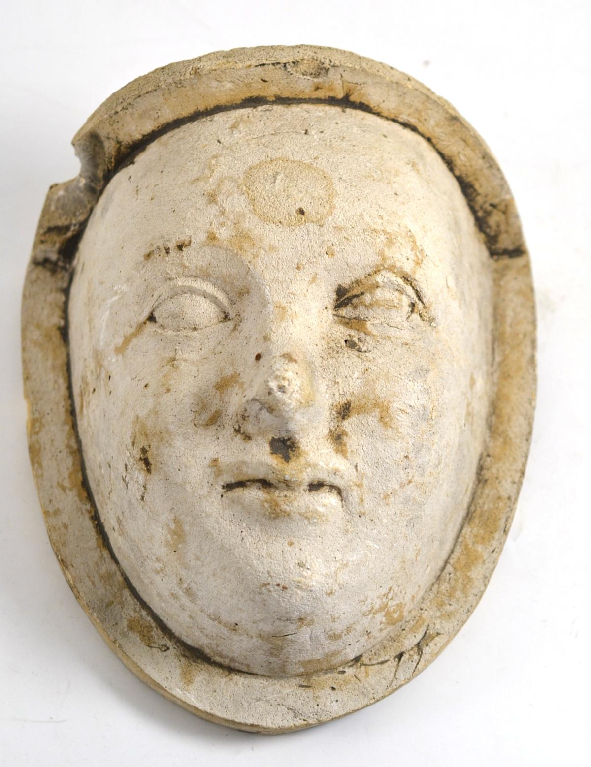 An 18th century plaster wall sconce as an effigy of a servant, circa 1780, height 22cm  Provenance