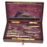 A 19th century Swiss drawing instrument set in a mahogany hinged box, stamped W Willett