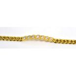 An 18ct gold diamond bracelet, seven round brilliant cut diamonds in yellow rubbed over settings, on