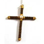 A mourning pendant, of plaited hair in cross form, with a central pearl, measures 5.4cm by 7.5cm