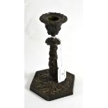 Early 19th century bronze candlestick, 18cm high