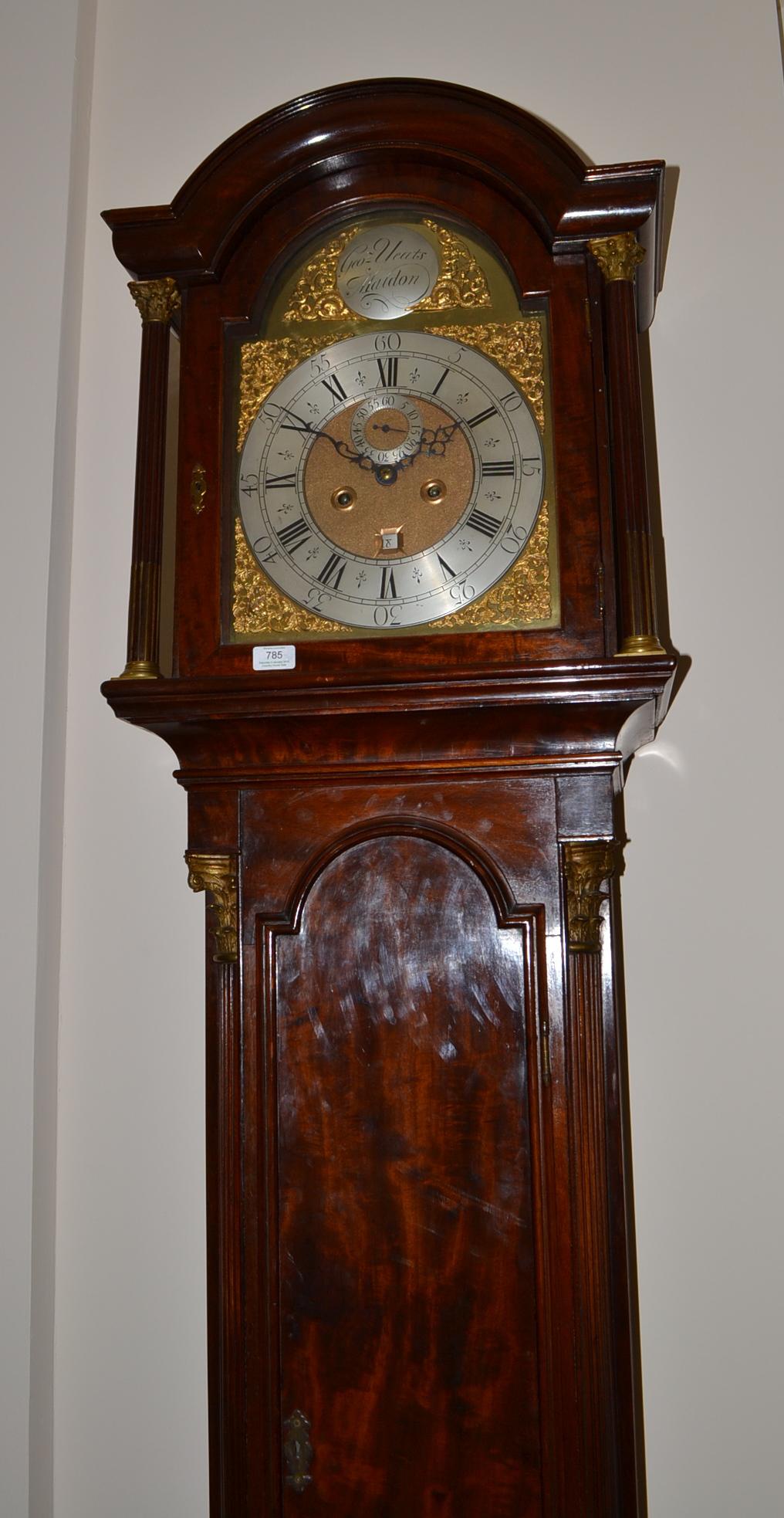 A mahogany eight day longcase clock, arched hood, Corinthian stop fluted columns, 12-inch arched