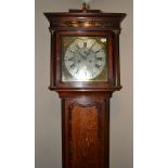 An oak eight day longcase clock, signed Jno Stanger, Nantwich, circa 1810, caddied pediment,