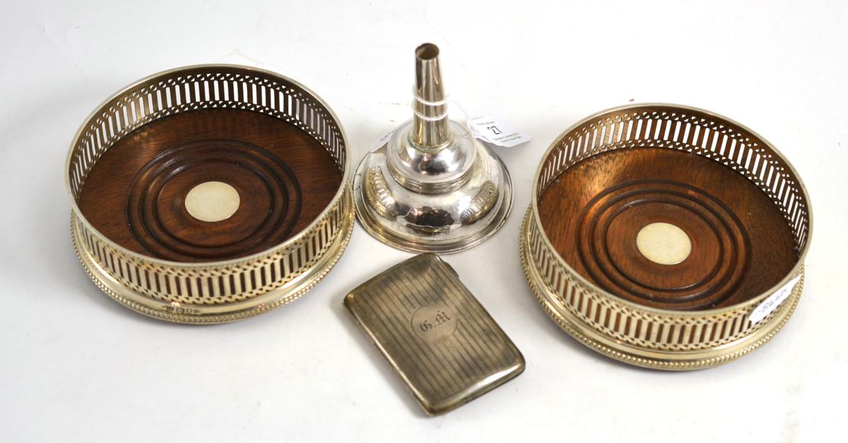 A pair of silver bottle coasters, London 1990, a Georgian silver wine funnel (worn marks) and a