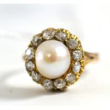 A pearl and diamond cluster ring, the pearl within a border of old cut diamonds in yellow claw