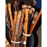 Two bundles of mainly carved hardwood and African walking sticks