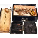 A small quantity of jewellery including a cameo stick pin, in (very damaged) case, an albert,