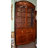 A Regency mahogany and ebony strung secretaire bookcase