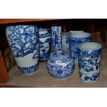 A Chinese blue and white charger, two table lamps, three modern blue and white vases, jar and
