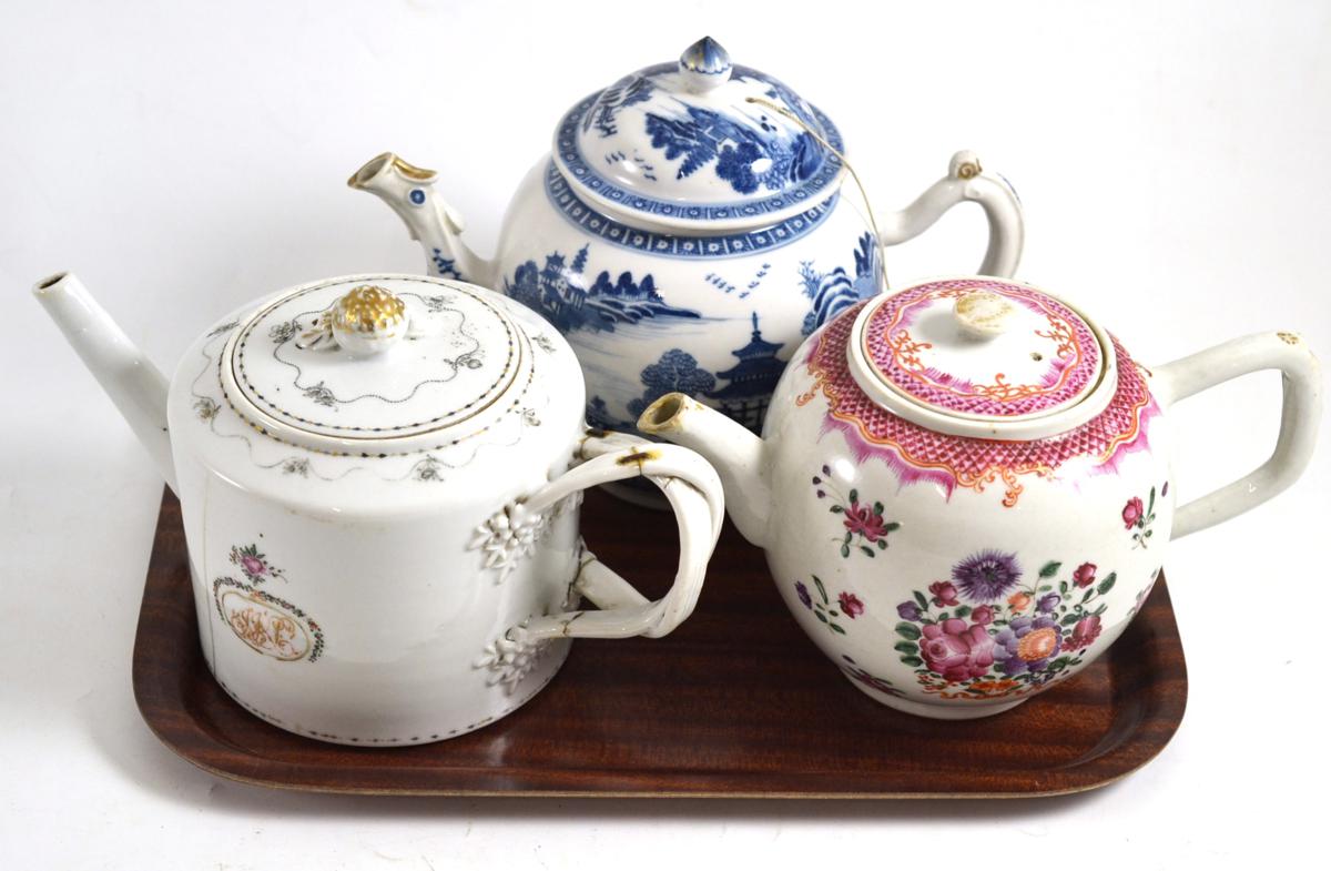 An 18th century Chinese porcelain teapot and cover with famille rose decoration, a similar blue