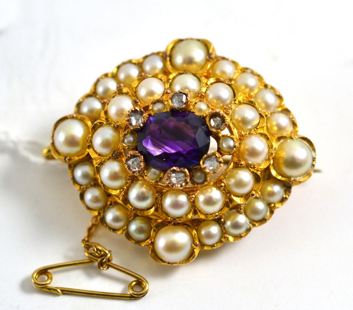 An amethyst, diamond and split pearl brooch, of lozenge form, in yellow crimped settings, measures