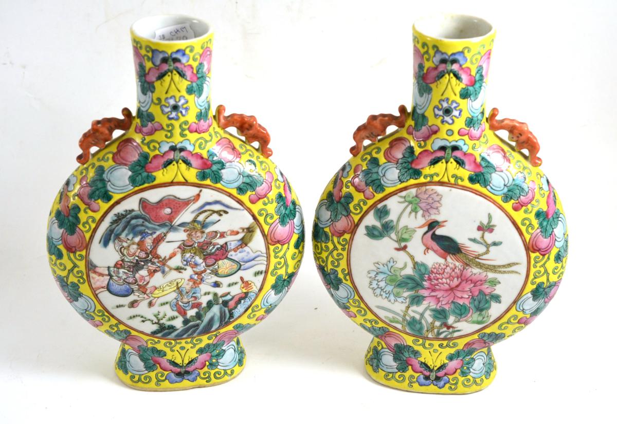 A pair of late 19th century Chinese famille jeune porcelain moon flasks, 30cm high