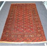 Tekke rug, Emirate of Bukhara, the madder field with three rows of quartered guls enclosed by