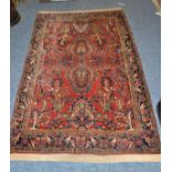 Saroukh rug, West Persia, the terracotta field of angular plants around a skeletal medallion