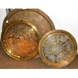 Three Cairo ware brass chargers, 41cm, 47cm and 60cm diameter (one signed)