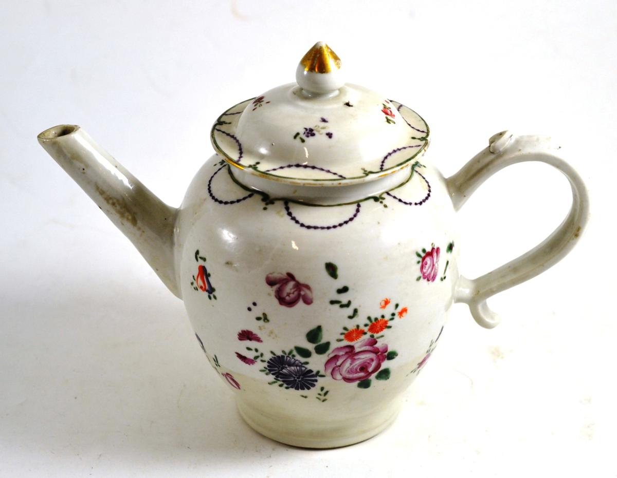 An early 19th century famille rose teapot and cover, 17cm high