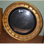 A Regency style ball surmounted convex mirror