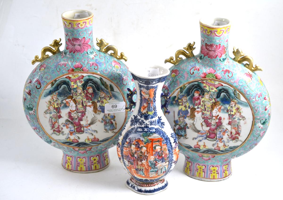 A pair of Chinese famille rose moon flask vases, height 31cm together with a Chinese polychrome