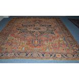 Heriz Carpet of square form, Persian Azerbaijan, the terracotta field of angular vines around an