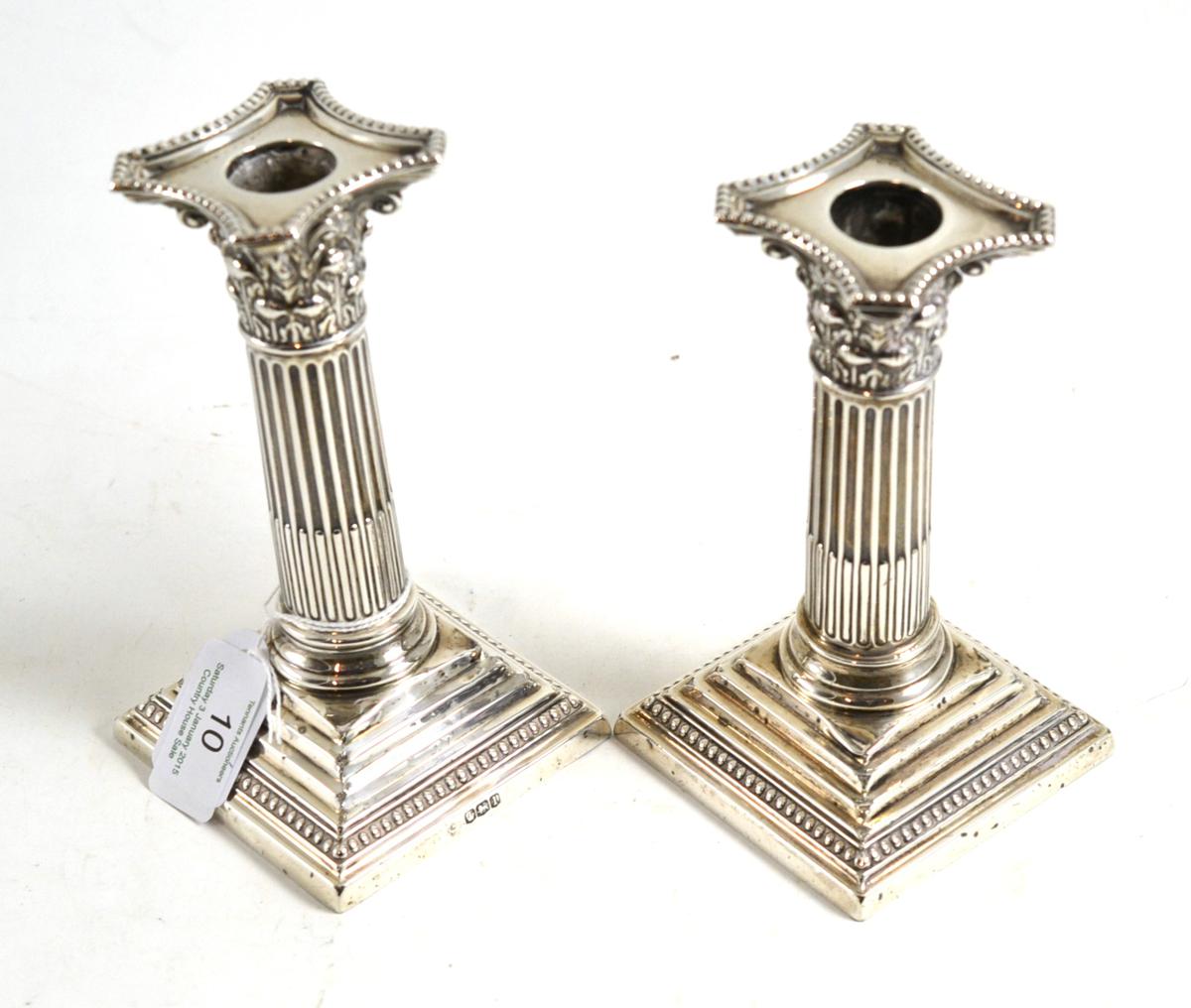 A pair of George V silver candlesticks, Sheffield 1928, 16cm high