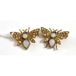 Two 9ct gold opal and seed pearl bug brooches, with ruby set eyes, each measures 2.9cm by 2.2cm