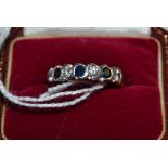 An 18ct gold sapphire and diamond half eternity ring, round brilliant cut diamonds alternate with