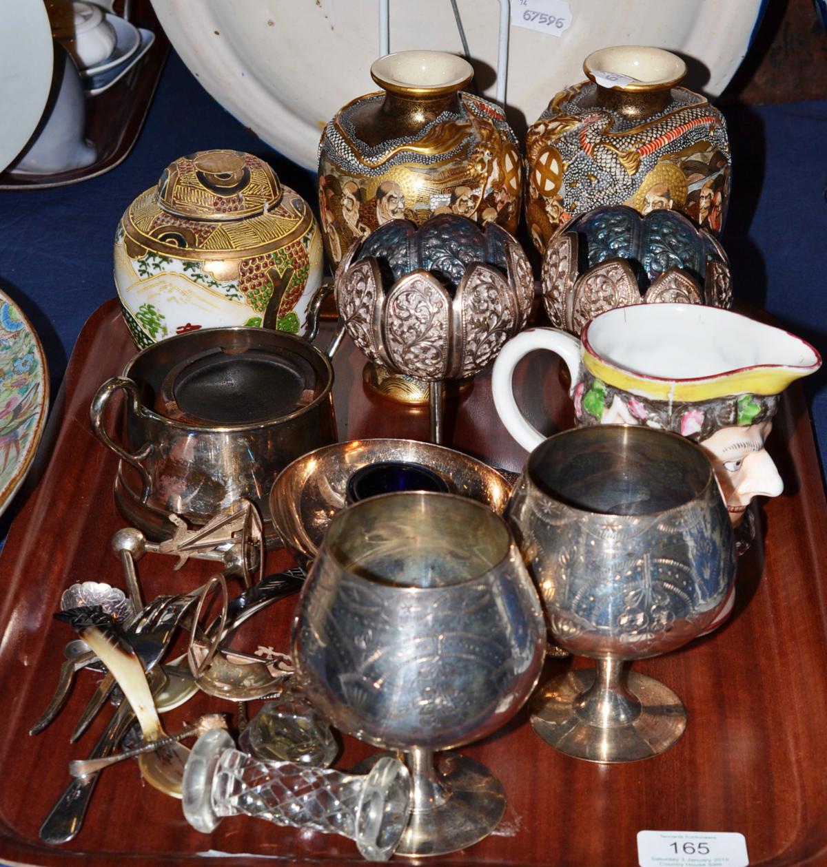 A pair of Japanese satsuma vases, a ginger jar (a.f.), a mask jug, another mask jug, two plated