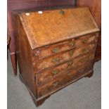 George II walnut and feather-banded bureau