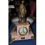 A marble striking mantel clock, circa 1910, patinated figure with a deer beside, gilt metal