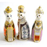 Three Royal Crown Derby cats (lacking stoppers), 22cm high