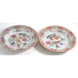 A pair of 18th century famille rose soup bowls, 22cm diameter