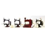 Four Miniature Sewing Machines including a Vulcan Senior, two Essex Machines and a Singer Machine