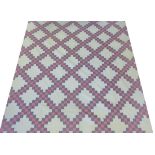Late 19th Century Quilt in pink and mauve Irish chain pattern, 200cm by 210cm
