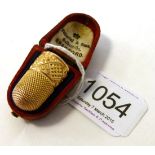 A 9ct Gold Thimble in a red morocco case by Fattorini & Sons