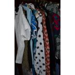 Quantity of assorted circa 1960's crimplene suits, lace mounted tops, dresses, suits etc