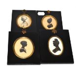 Four portrait miniatures depicting ladies