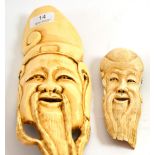 Two early 20th century Chinese ivory mask carvings