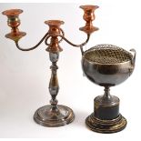 A silver pedestal bowl on wooden base and a silver plated candelabra