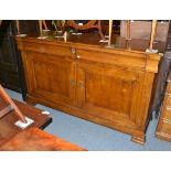 A reproduction hardwood sideboard