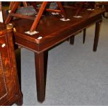A late 18th century mahogany serving table with square chamfered legs