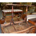 A pair of Regency style mahogany and ebony strung tripod tables