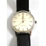 A stainless steel automatic wristwatch, signed Omega Seamaster, with Omega box