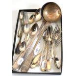 A collection of continental white metal flatware including two soup ladles